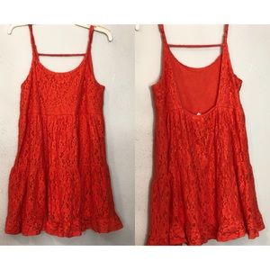 Orange Cavenders dress.